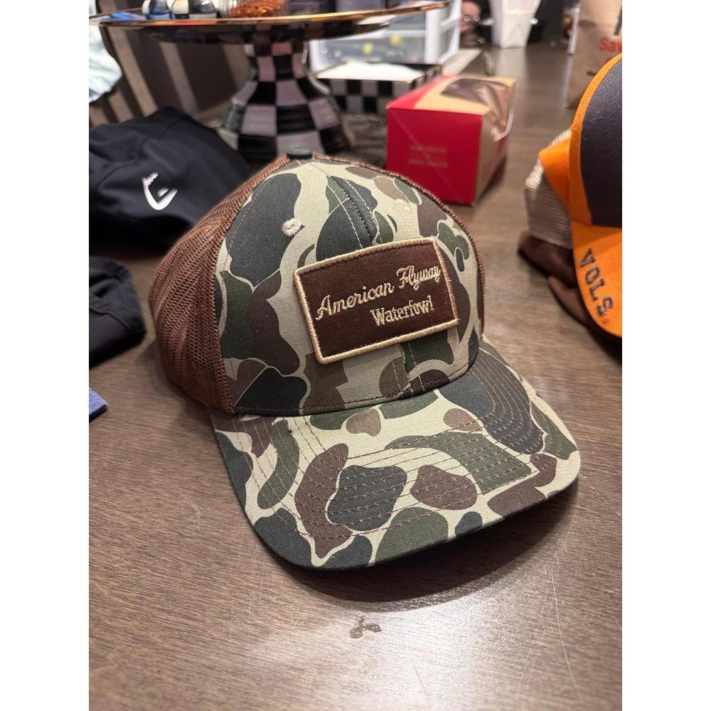 American Flyway Waterfowl trucker hat features a distinct "old school" camo